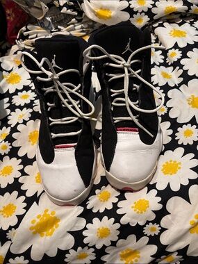 Jordan Women’s Black, White and Pink High-Top Sneakers
